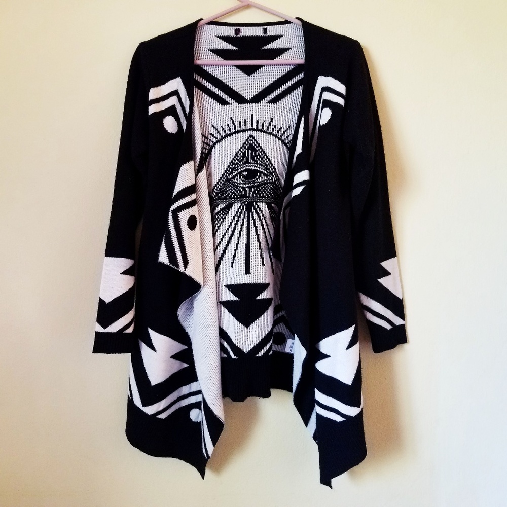 long, black and white patterned cardigan sweater